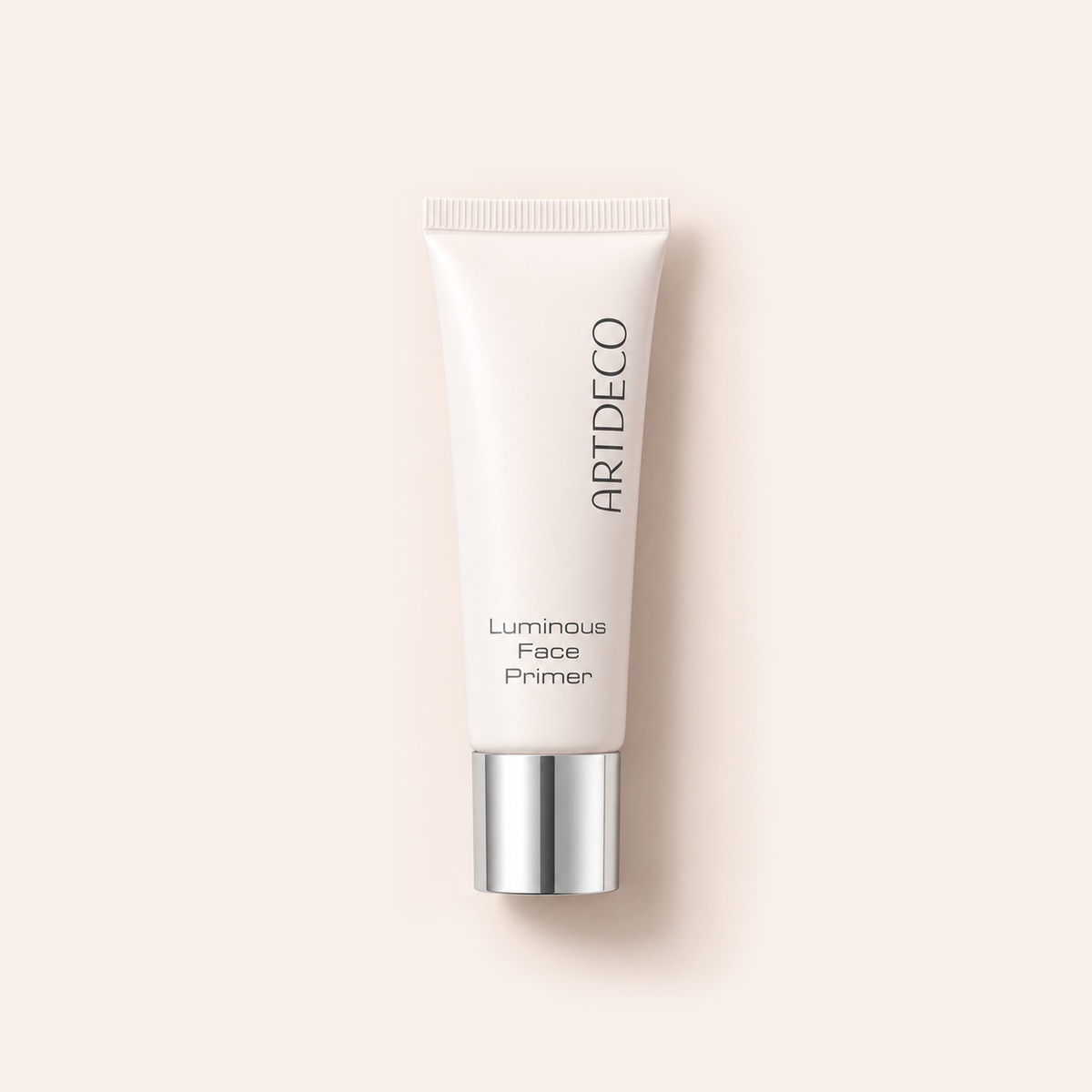 Tuba podkladu pod makeup Artdeco Luminous Face Primer 25 ml na béžovém pozadí – MrRizz