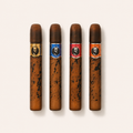 Čtyři miniatury pánských toaletních vod Cuba Gold, Blue, Red a Orange po 5 ml na světlém pozadí – MrRizz