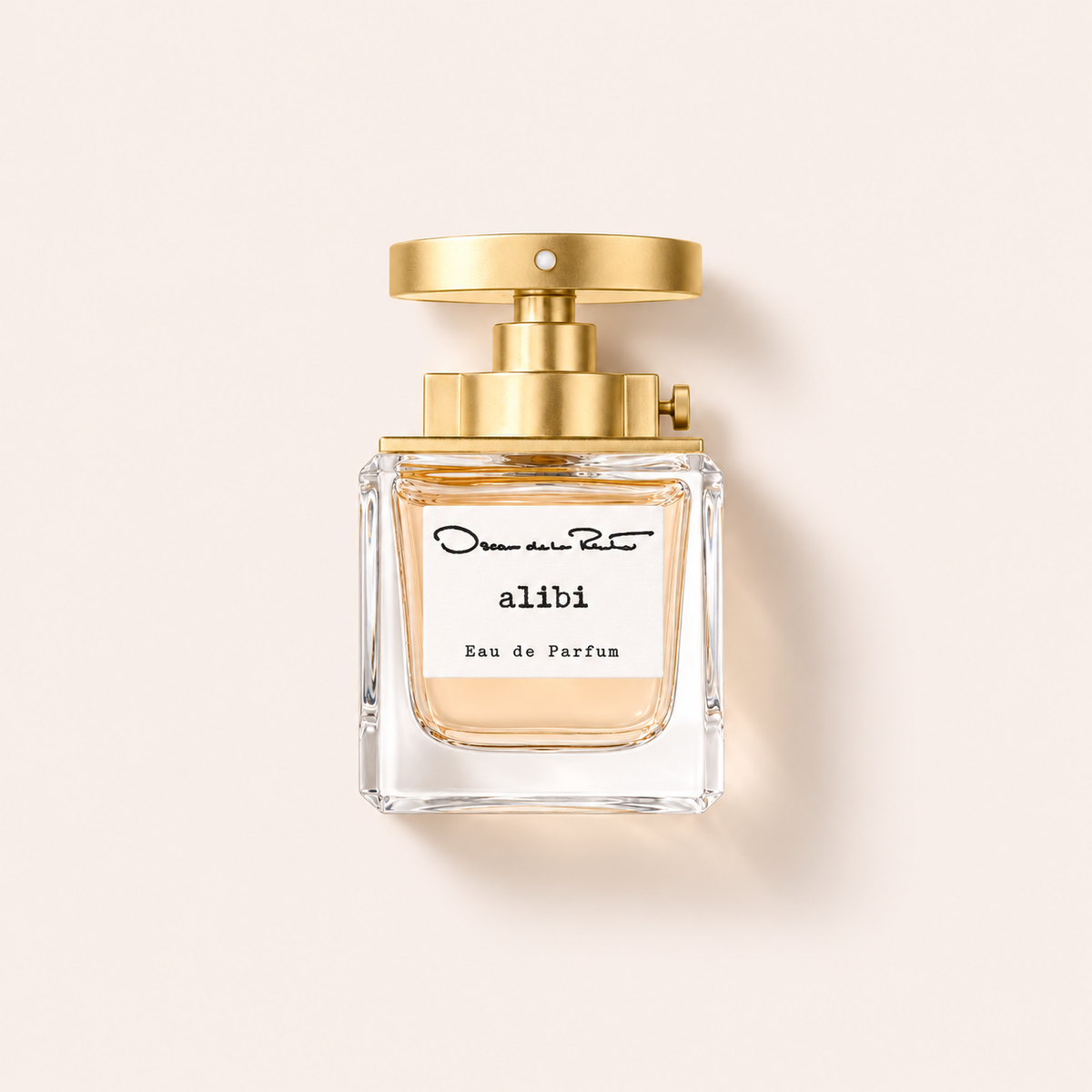 Oscar de la Renta Alibi EDP 50 ml na béžovém pozadí – MrRizz